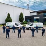 The MI Service Group team in front of their service vans